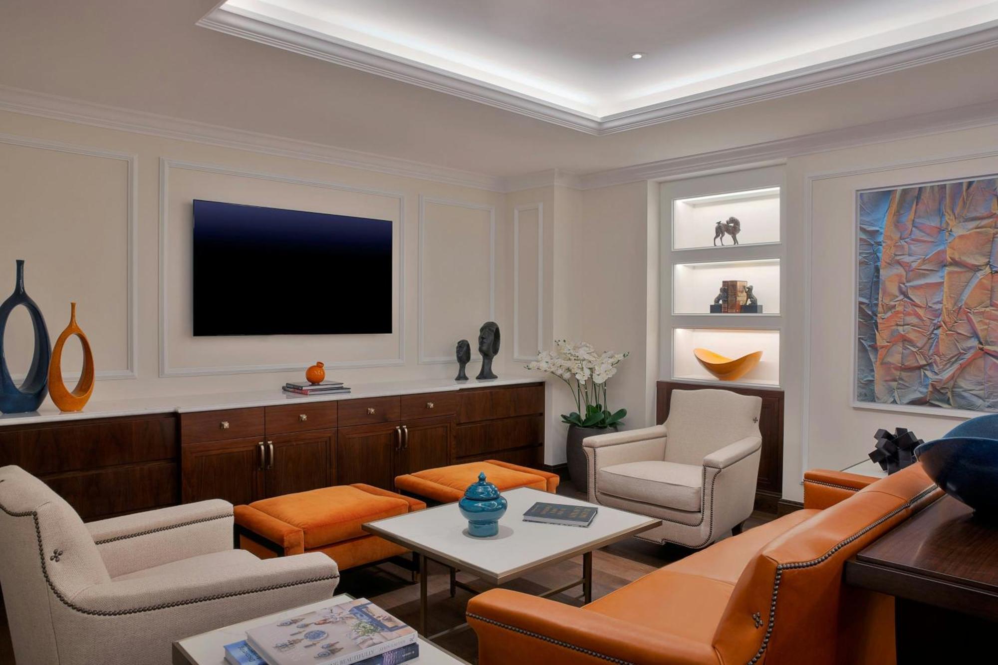 The Ritz-Carlton, Amman酒店 外观 照片 A living room with indirect lighting